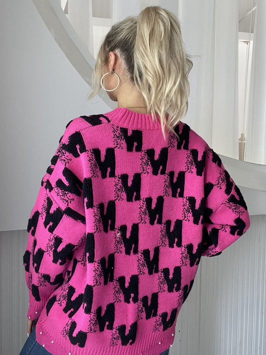 Strickjacke mit Perlenbesatz und V-Ausschnitt und Knopfleiste