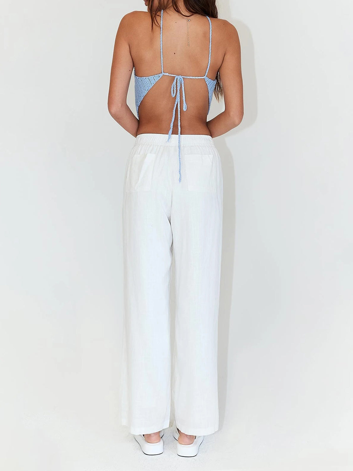 Top sin mangas con lazo en la espalda