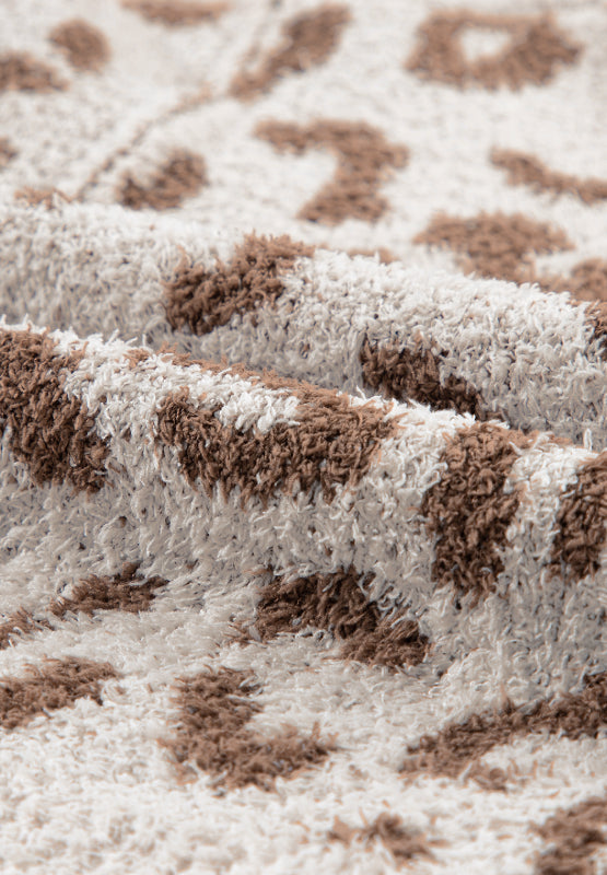 Langärmliger Pullover mit Leopardenmuster und halbem Reißverschluss