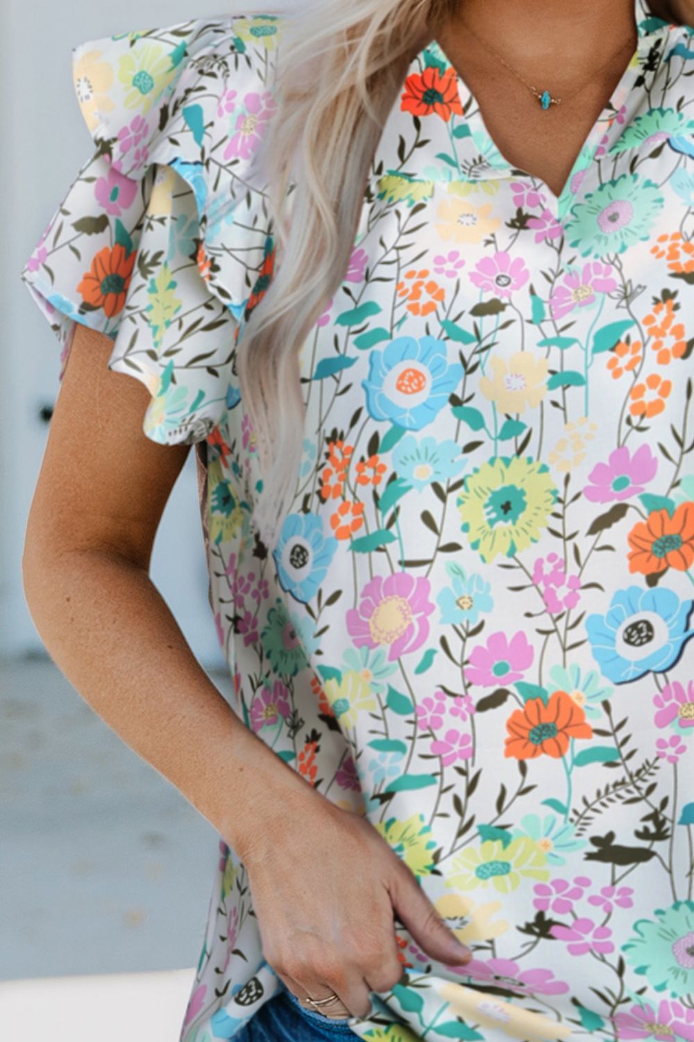 Bluse mit Blumenmuster und Flügelärmeln
