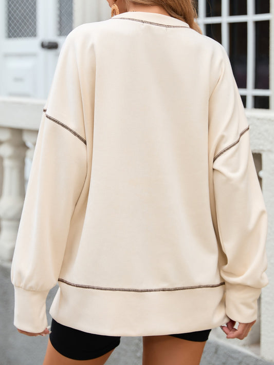 Langärmliges T-Shirt mit Rundhalsausschnitt und Schlitz