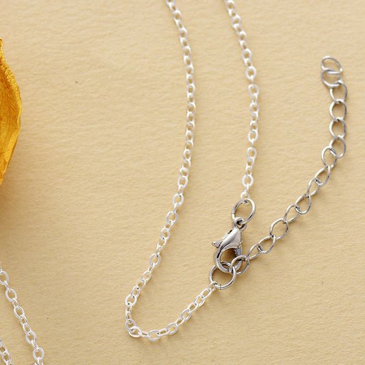 Halskette mit türkisfarbenem Kettenanhänger