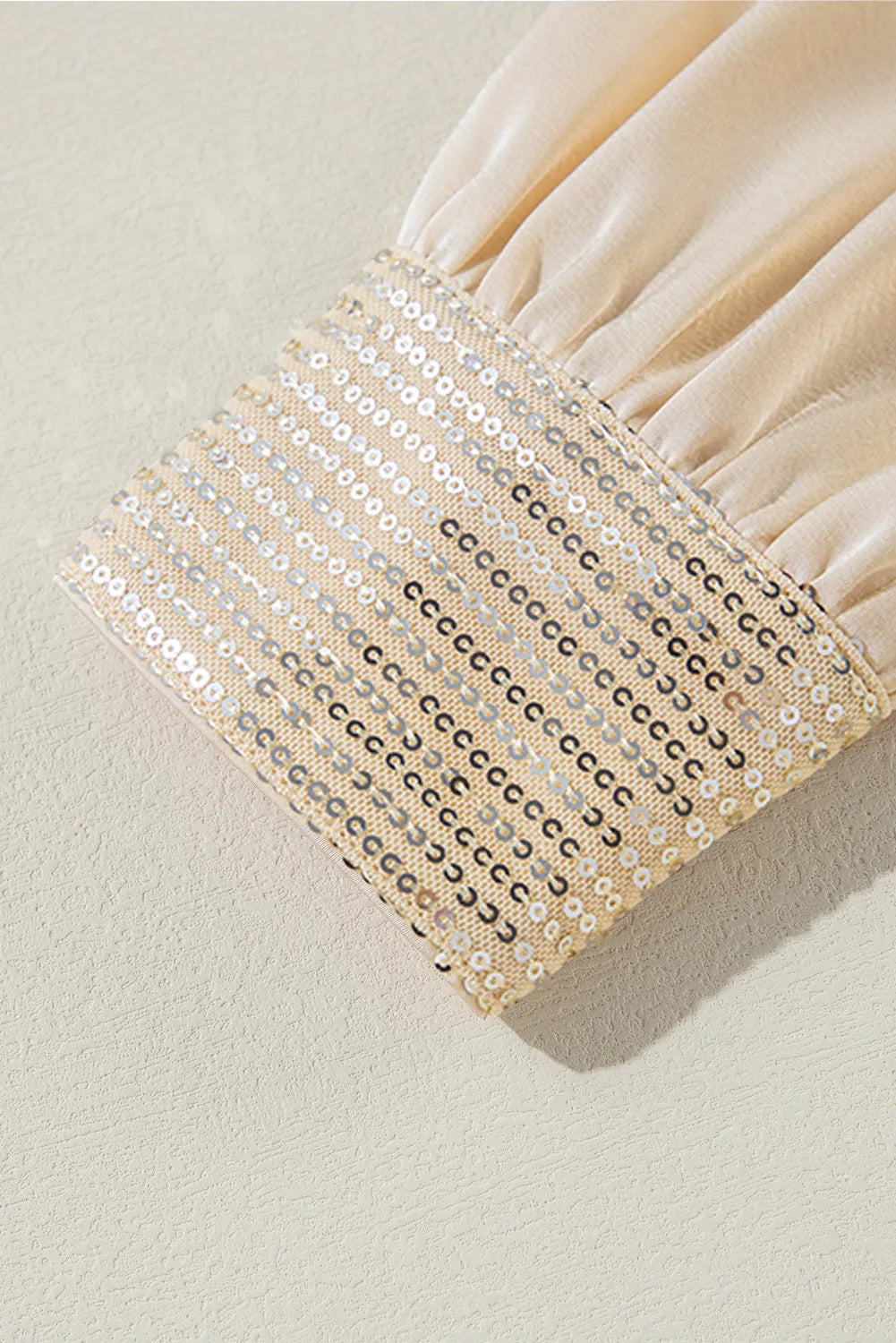 Pailletten-Bluse mit Rundhalsausschnitt und langen Ärmeln