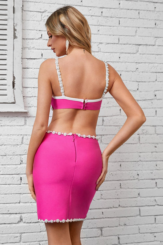 Bandagekleid mit Cut-outs und Perlenbesatz