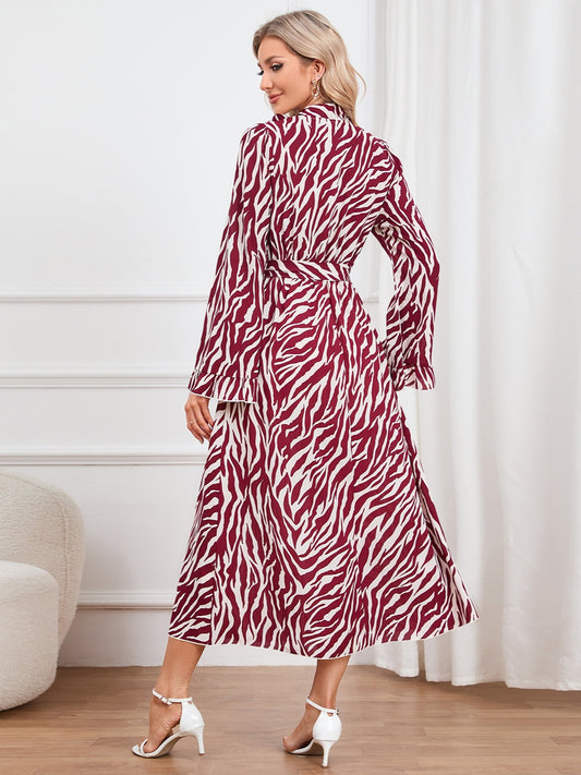 Kleid mit Animalprint, Bindeband vorn und Rüschenbesatz
