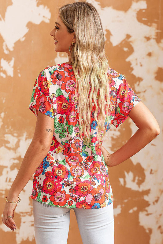 Bedruckte, kurzärmlige Bluse mit Einkerbungen