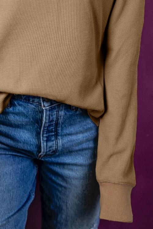 Top tipo jersey con cuello y cremallera y patchwork de punto tipo gofre