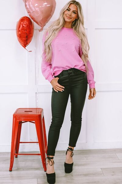 Sweatshirt mit Rundhalsausschnitt und überschnittenen Schultern und Perlen