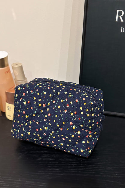 Clutch mit Blumenmuster und gestepptem Karofutter