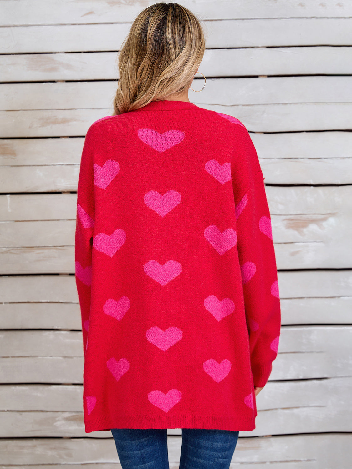 Langärmlige Strickjacke mit Engelsflügeln und Herzmuster, vorne offen