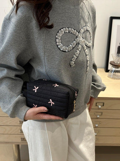 Armband mit kontrastierender Textur und Schleife