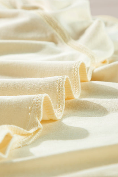 Langärmliges Oberteil mit seitlichem Schlitz und Kerbe