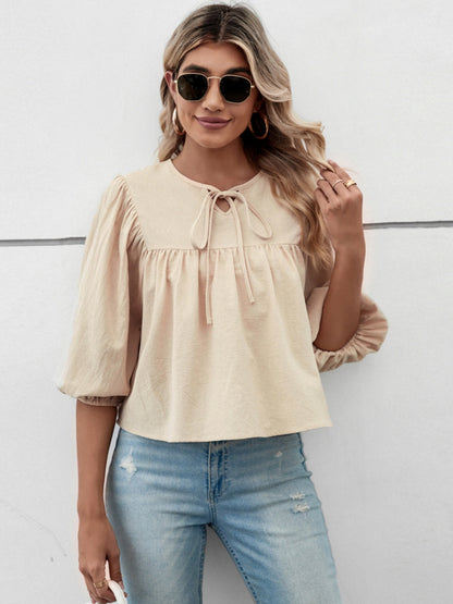 Bluse mit Ballonärmeln und Bindeband am Ausschnitt