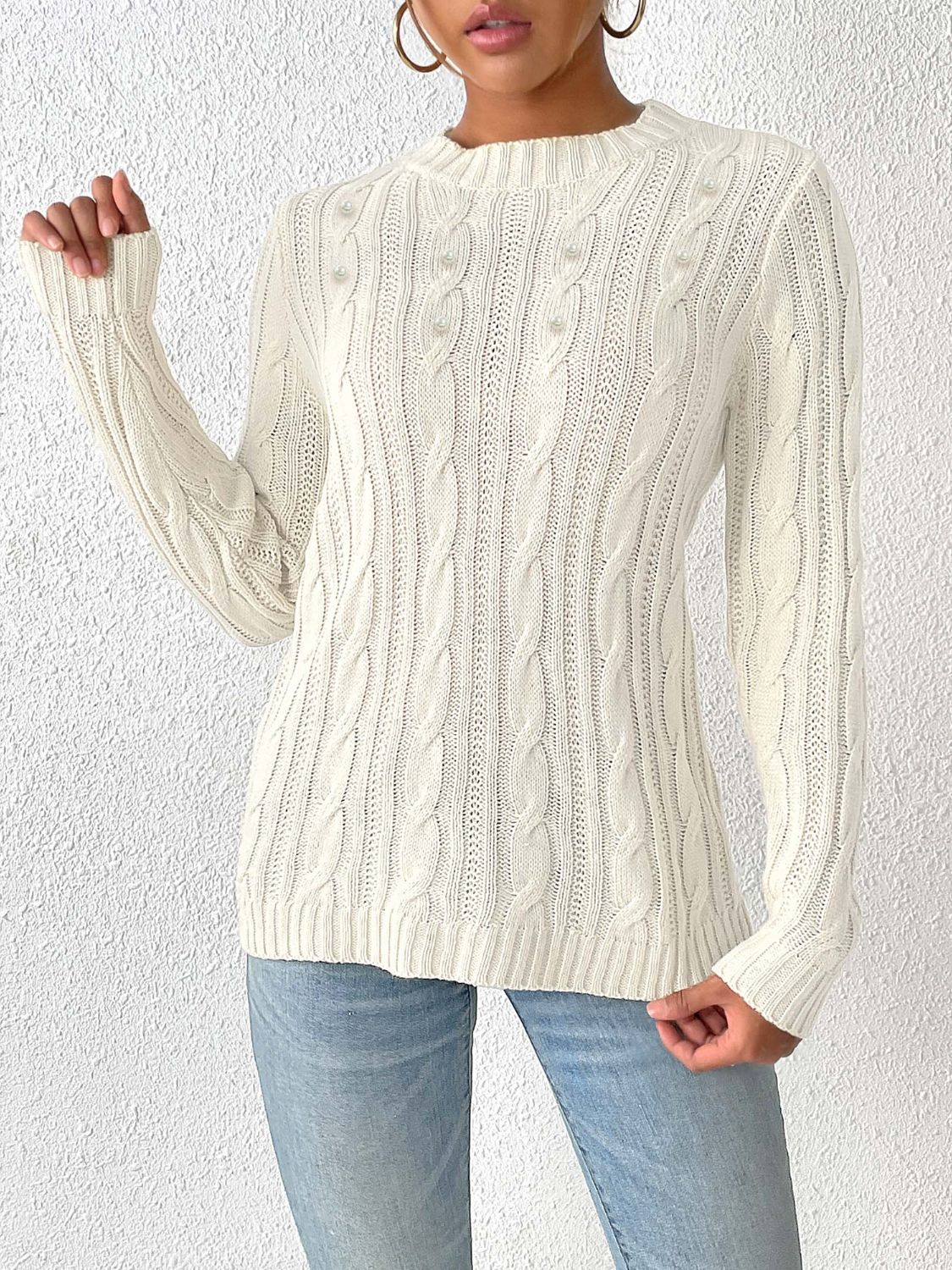 Pullover mit Rundhalsausschnitt und langen Ärmeln und Zopfmuster