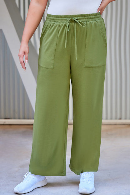 Pantalones rectos con cordón y bolsillos de talla grande