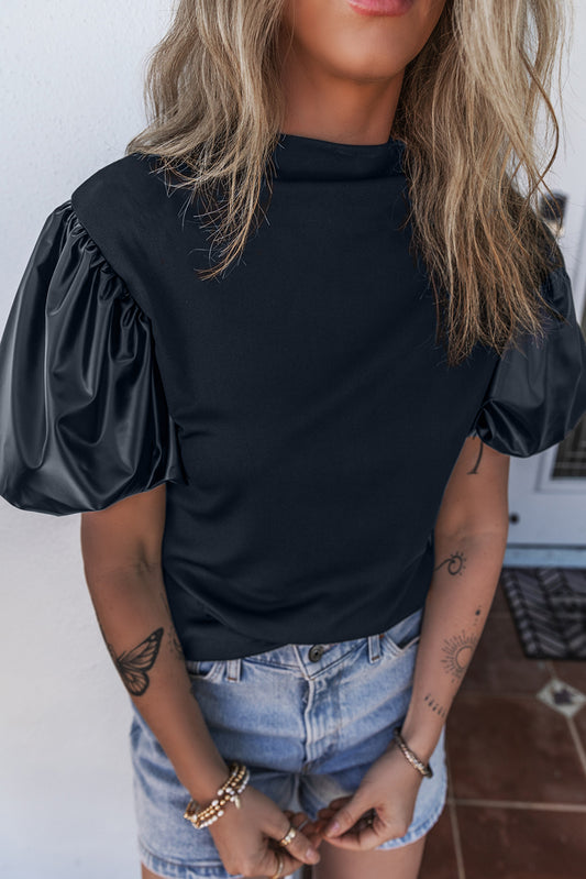 Blusa con cuello redondo y manga abullonada