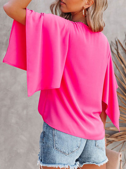 Bluse mit V-Ausschnitt und halblangen Ärmeln