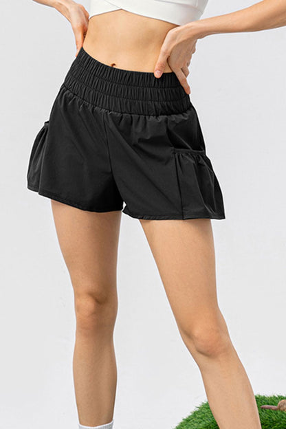 Aktive Shorts mit Taschen und elastischer Taille