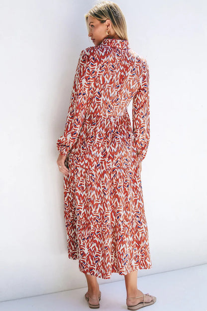Bedrucktes Kleid mit langen Ärmeln und Kerben