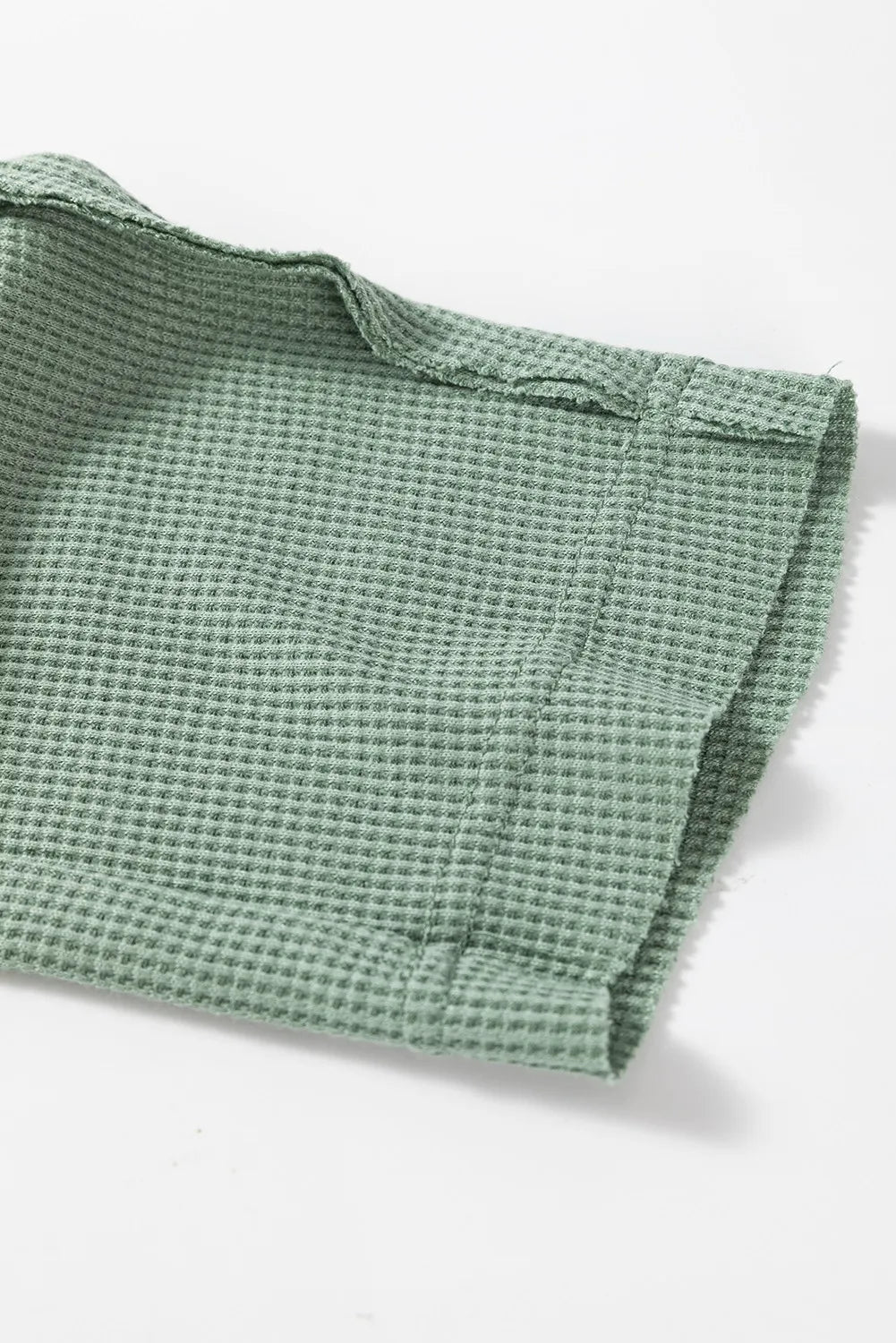 Langärmliges Oberteil mit halbhohem Knopf