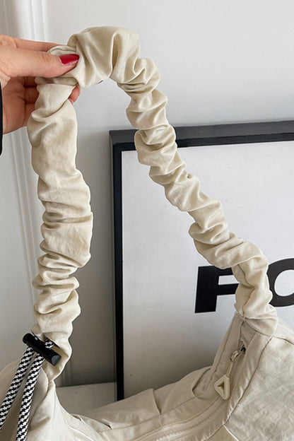 Umhängetasche mit Kordelzug und Rüschen