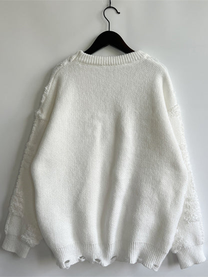 Langärmliger Pullover mit Rundhalsausschnitt und Perlendetail