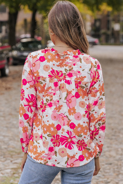 Langärmlige Bluse mit Blumenmuster, V-Ausschnitt und Rüschen