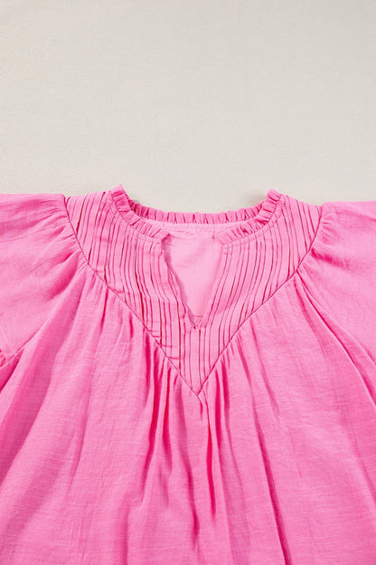 Bluse mit Rüschen und Flügelärmeln