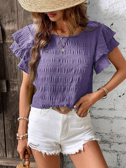 Blusa con cuello redondo y mangas con volantes