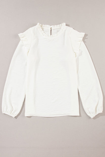 Bluse mit Stehkragen, Rüschen und Ballonärmeln