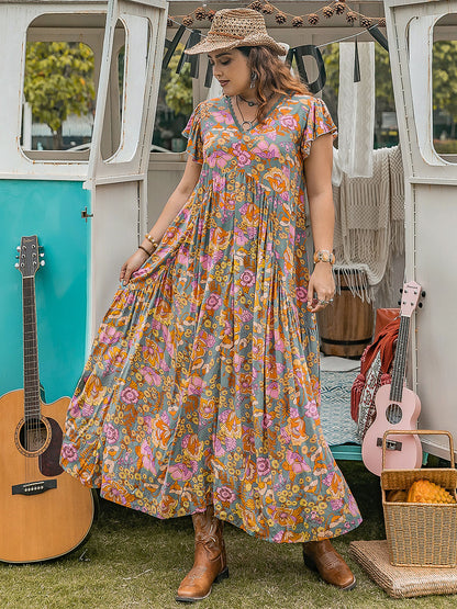 Kleid mit Flügelärmeln und Rüschen und Print in Übergröße