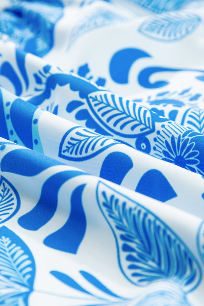 Kurzärmliges Minikleid mit Stufenmuster und Print