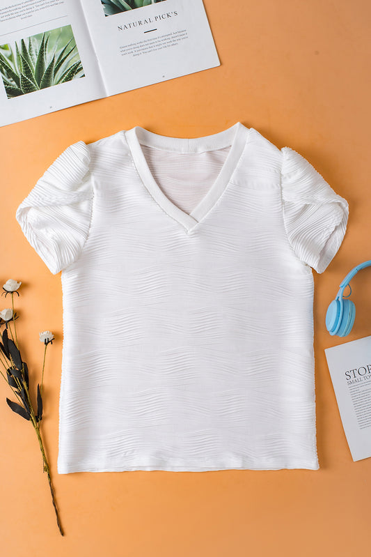 Bluse mit V-Ausschnitt und Blütenärmeln