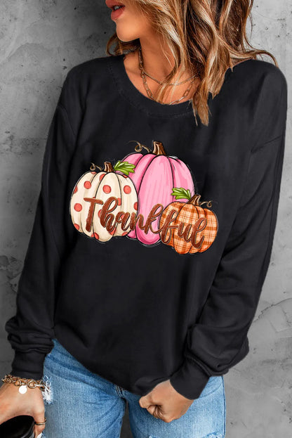 Sweatshirt mit Rundhalsausschnitt und überschnittener Schulterpartie und Kürbis-Grafik