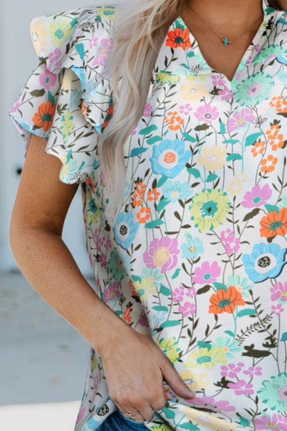 Bluse mit Blumenmuster und Flügelärmeln