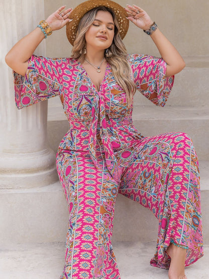 Bedruckter Jumpsuit mit halblangen Ärmeln und weitem Bein in Übergröße