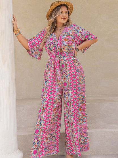 Bedruckter Jumpsuit mit halblangen Ärmeln und weitem Bein in Übergröße