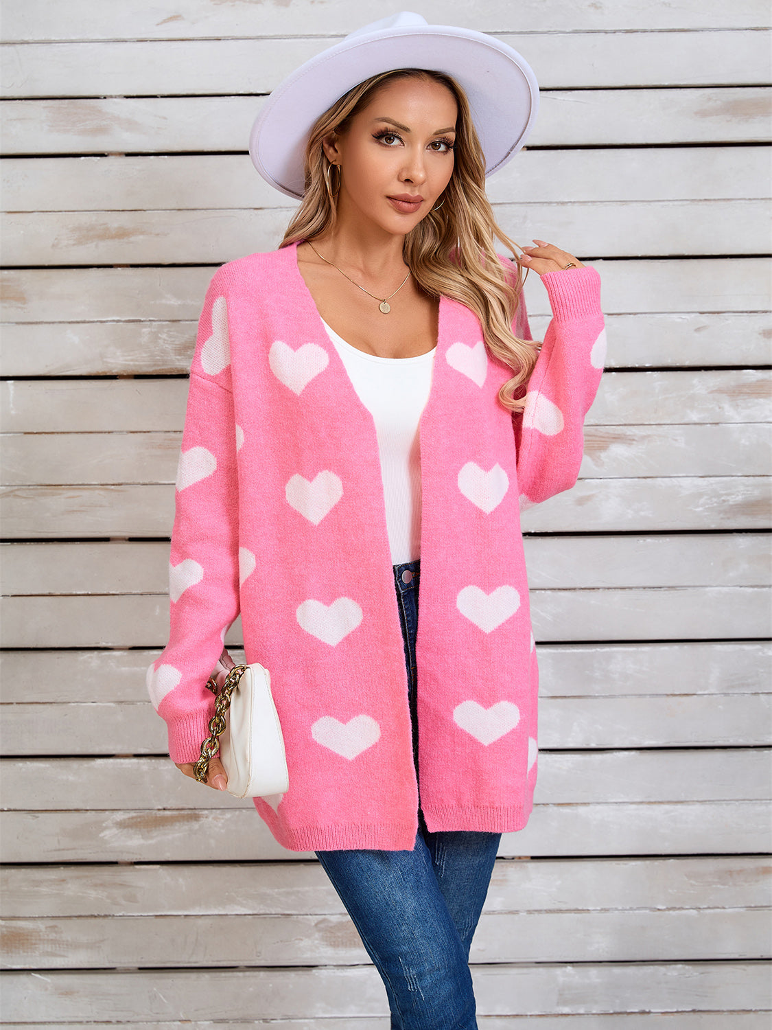 Langärmlige Strickjacke mit Engelsflügeln und Herzmuster, vorne offen