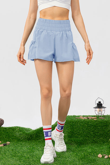 Aktive Shorts mit Taschen und elastischer Taille