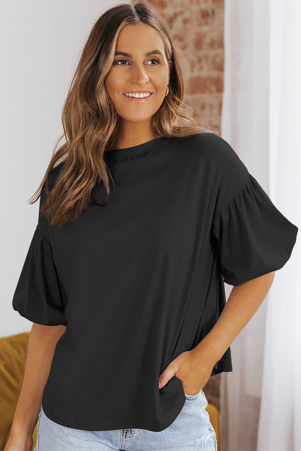 Bluse mit Puffärmeln und abgerundetem Saum