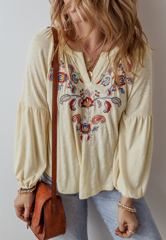 Bestickte Bluse mit gekerbten Ärmeln