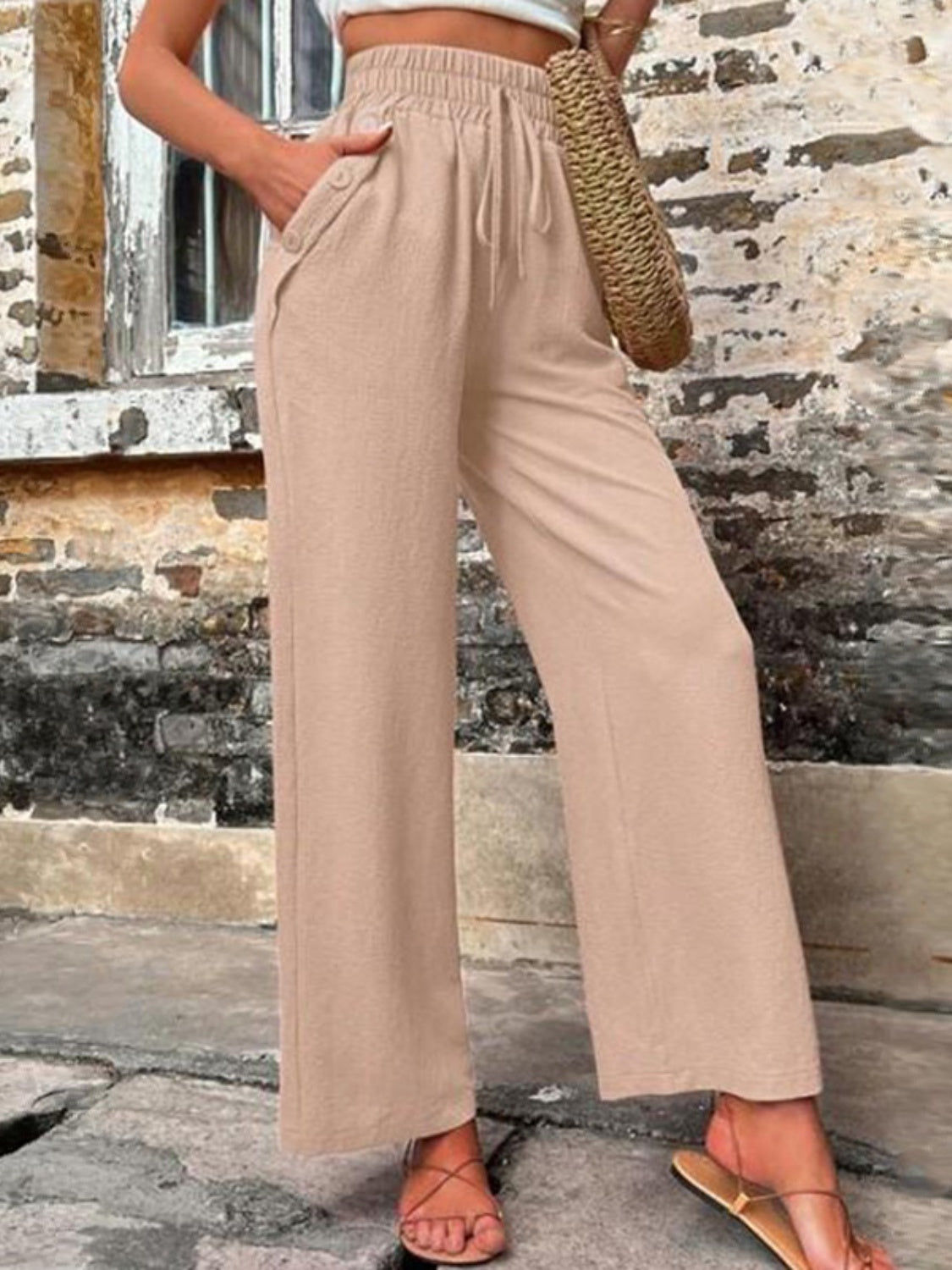 Weite Hose mit hoher Taille und Taschen zum Binden