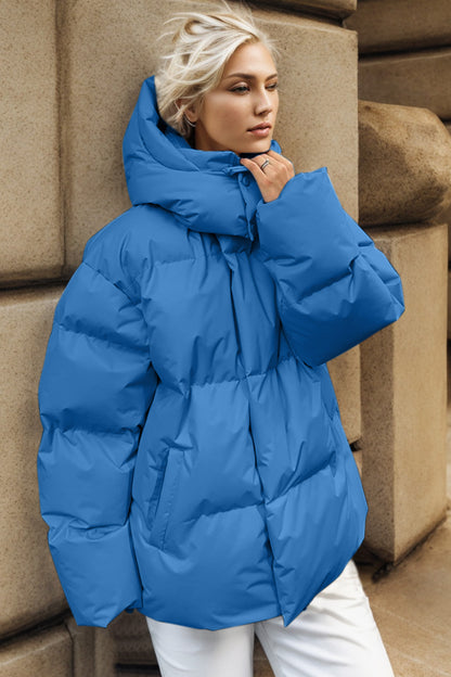 Pufferjacke mit Reißverschluss und Kapuze und Taschen