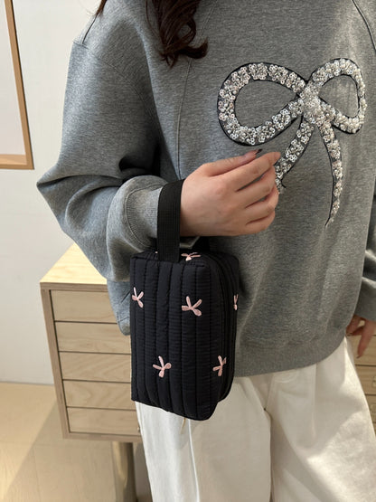 Armband mit kontrastierender Textur und Schleife