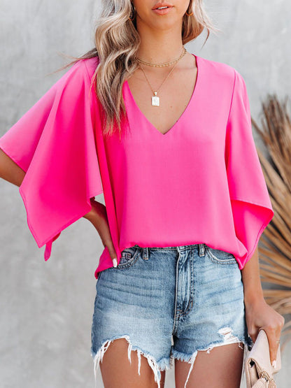 Bluse mit V-Ausschnitt und halblangen Ärmeln