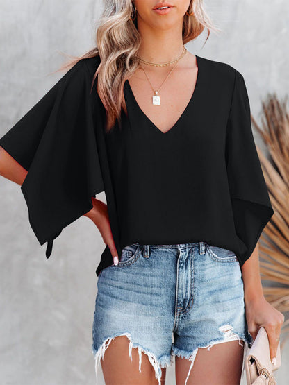 Bluse mit V-Ausschnitt und halblangen Ärmeln
