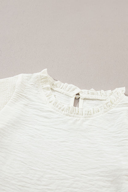 Bluse mit Stehkragen, Rüschen und Ballonärmeln