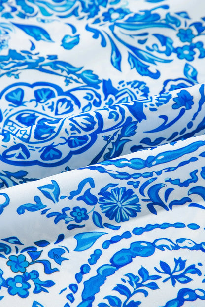 Bedrucktes, langärmliges Minikleid mit Bindeband am Kragen