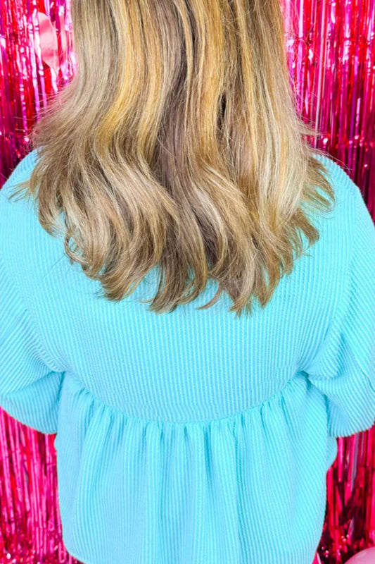 Strukturierte Bluse mit Schößchen und langen Ärmeln in Übergröße