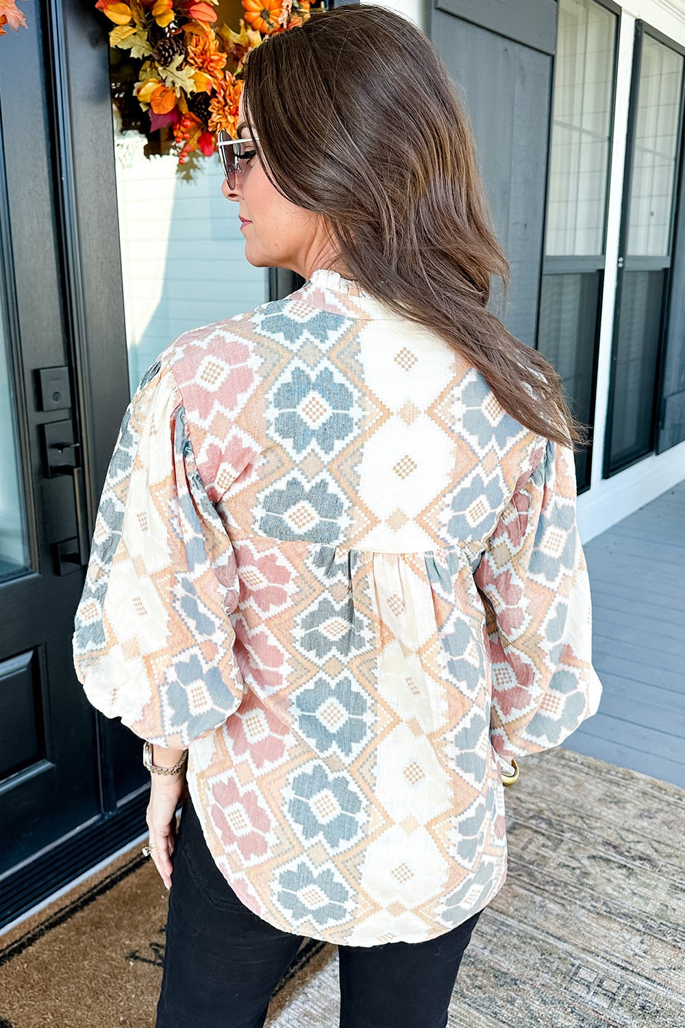 Bluse mit Ballonärmeln und Quasten zum Binden am Hals